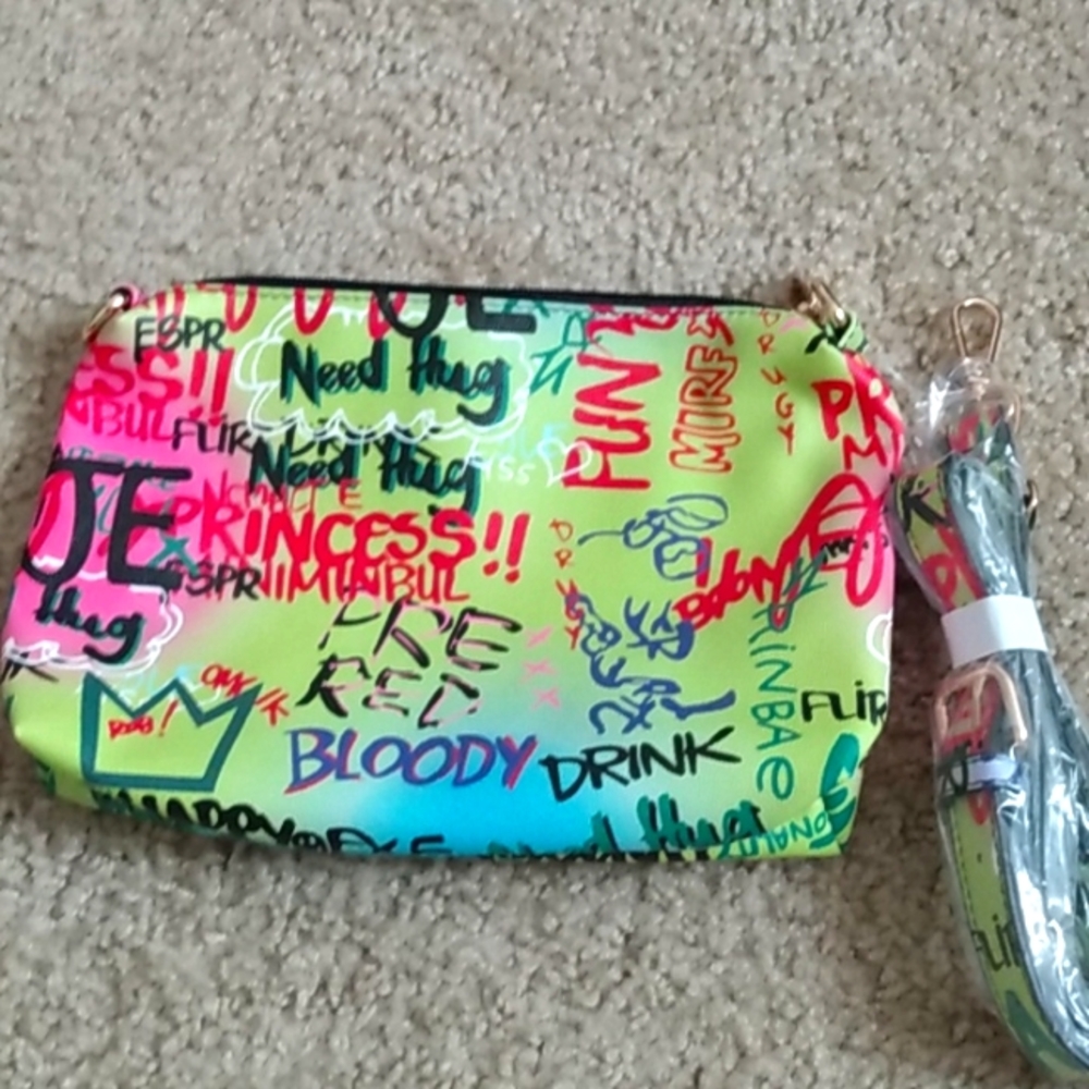 A medium size purse with a strap